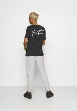 YOURTURN Unisex - Tracksuit Bottoms - Mottled Light Grey 9 YOURTURN Unisex - Tracksuit Bottoms - Mottled Light Grey -Yourturn Shop 44af697d8af34693a7b3385401313f6d scaled