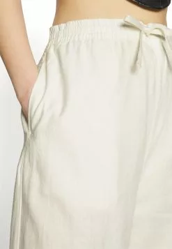 YOURTURN Genderless Parachute Unisex - Trousers - White -Yourturn Shop 550eb4063f7e4f1cbca9890550f66ec1 scaled