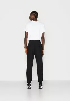 YOURTURN Unisex - Tracksuit Bottoms - Black -Yourturn Shop 93239351f3ae4382bd2bf96cade29d39 scaled