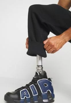 YOURTURN Unisex - Tracksuit Bottoms - Black -Yourturn Shop 96890d6b49c24a0ca097867b183abe35 scaled