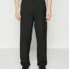 YOURTURN Unisex - Trousers -Black