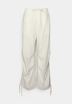YOURTURN Genderless Parachute Unisex - Trousers - White -Yourturn Shop e139fd63cae746a1b32af638a2d54d38 scaled