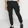 YOURTURN Unisex - Tracksuit Bottoms - Black