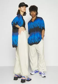 YOURTURN Genderless Parachute Unisex - Trousers - White -Yourturn Shop f47a0e1ecff04f00b66902953e5c6730 scaled